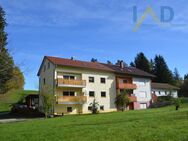 Ansprechendes Mehrfamilienhaus mit großem Garten - Regen