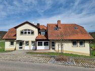 Gepflegtes Mehrfamilienwohnhaus mit Gewerbe und großem, sonnigen Garten in toller Lage von Unterschleichach - Oberaurach