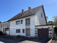 Freistehendes Einfamilienhaus mit Garten, Carport und Garage in Ottweiler - Ottweiler