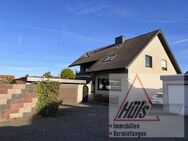 Gepflegtes Zweifamilienhaus mit zusätzlichen Appartement, Doppelgarage in ruhiger Siedlungslage - Osnabrück