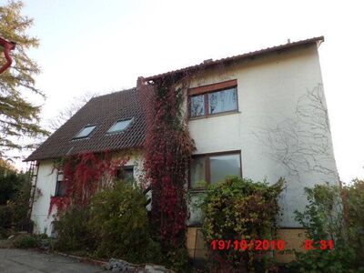 - reduziert - Zweifamilienwohnhaus mit einem ca. 3.259 m² großen Grundstück in Großheirath