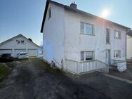 Gepflegtes 2 Familienhaus teilvermietet mit großem Grundstück in Calden/ Obermeiser - Calden