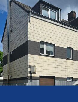 Schönes Mehrfamilienhaus mit Gewerbe und 1 XXL-Garage - Gladbeck