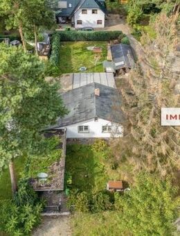 IMMOBERLIN.DE - Wohlfühllage: Netter Bungalow auf herrlichem Grundstück - Hoppegarten