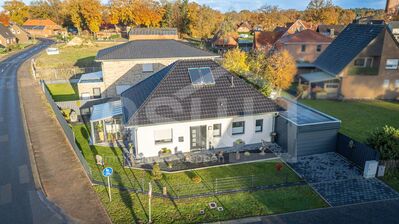 hochwertiger, top gepflegter Bungalow mit Glassommergarten und Carport mit elektrischen Rolltoren!