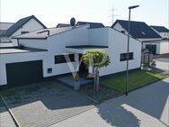 VON POLL IMMOBILIEN Moderner Bungalow mit Loft-Charakter - Inden