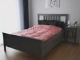 graues Ikea Bett mit gratis Nachttisch in 9434