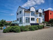 Familienfreundlich wohnen in Leiblfing: Lichtdurchflutetes Reihenendhaus mit Balkon und Garage - Leiblfing