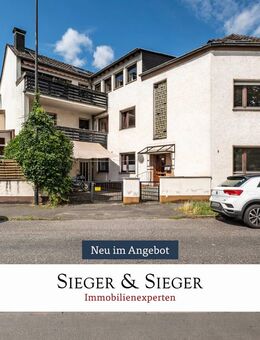 Vielseitiges Mehrfamilienhaus mit Potenzial - Sanierungsobjekt mit vermietetem Erdgeschoss - Troisdorf