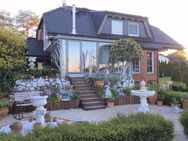 Luxuriöses Einfamilienhaus mit ELW und Traumgarten - Baunatal