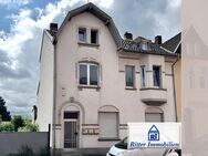 Ritter Immobilien e.K.: Gepflegtes MFH mit Innenhof & Doppelgarage in zentraler Lage von Kohlscheid! - Herzogenrath