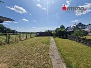 Zwei gepflegte Einfamilienhäuser mit großem Garten und herrlichen Fernblick - Würselen