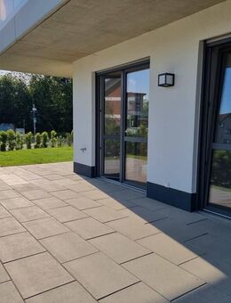 Kapitalanlage - Erdgeschoss-Eigentumswohnung mit Garten, Tiefgaragen- & Außenstellplatz - Lembruch