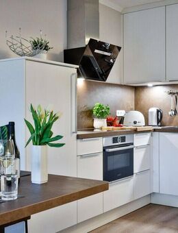 "OASE DER RUHE !" HIGH-CLASS-Wohnung mit LOGGIA und Stellplatz im Zentrum von W´ld ! - Sylt