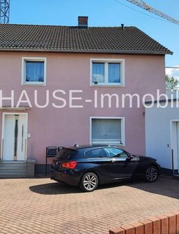 Vielseitiges Ein-/Zweifamilienhaus in guter Lage von Estenfeld - Estenfeld