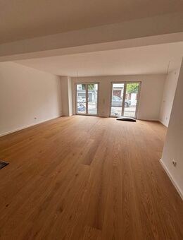 2-Zi-Neubau-Gartenwohnung über zwei Etagen & Hobbyraum beheizt mit Bad (Souterrain) - München