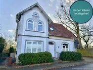 Altbaucharme im Herzen von Hetlingen: Ein-/ Zweifamilienhaus mit Garten und Doppelgarage - Hetlingen