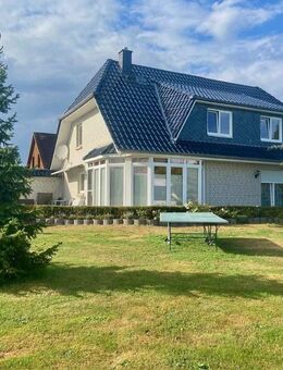 Exclusives Wohnen in Feldranlage - Einfamilienhaus mit Einliegerwohnung, Kamin und großem Obstgarten - Stockelsdorf