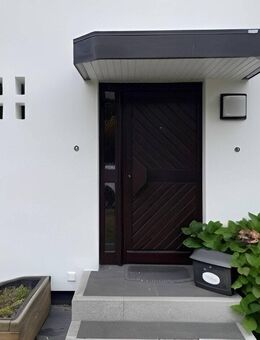 Charmantes Reihenhausjuwel mit frisch sanierter Fassade und liebevoll gepflegtem Charakter. - Wedel