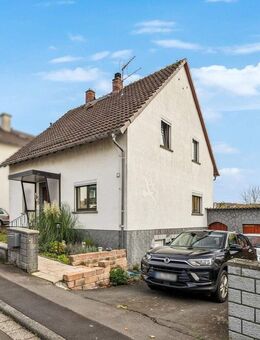 Charmantes Einfamilienhaus mit liebevoll gestalteten Garten - Nidda