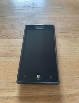 Ich biete ein gebrauchtes Samsung OMNIA 7 GT-I8700 mit zwei Original Akkus - Duisburg