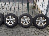 4x Kumho Wintercraft WP52 215/65 R16 98H auf Original VW Felgen - Bornich