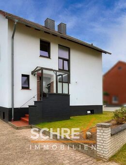 Hier beginnt Familienglück - charmantes Einfamilienhaus mit Kamin und Garten - Stemwede