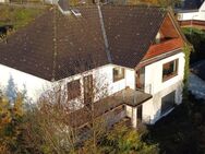 Einfamilienhaus mit Einliegerwohnung in beliebter Wohnlage von Bad Berleburg-Raumland - Bad Berleburg