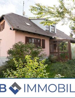 Großzügiges Einfamilienhaus mit Wintergarten und Doppelgarage in zentraler Lage von Hirschaid - Hirschaid