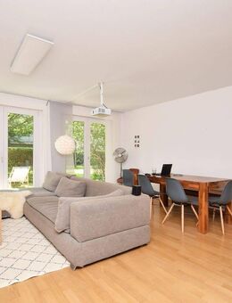 AIGNER - Moderne 2-Zimmer-Terrassenwohnung mit Gartenanteil in Neuhausen - München