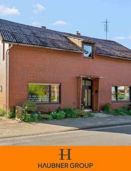 Einfamilienhaus mit ausbaufähigen Nebengebäuden - Wohnen, Arbeiten & Investieren in zentraler Lage - Loxstedt