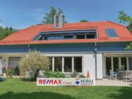 Grünwald: Stilvolle Architektur in Toplage - Villenhälfte in Waldrandlage - Grünwald