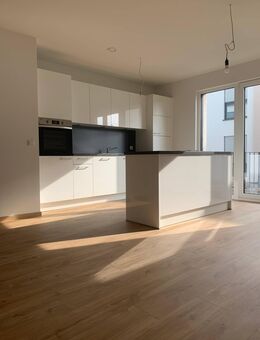 Großzügige Wohnung mit eigenem Gartenanteil & Einbauküche - Langenselbold