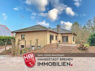 Grasberg / Attraktiver Bungalow mit großem Grundstück und Garage - Grasberg