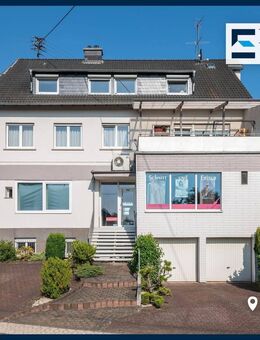 Interessantes Wohn- und Geschäftshaus mit 15 Stellplätzen, 2 Garagen und Entwicklungspotenzial - Sohren