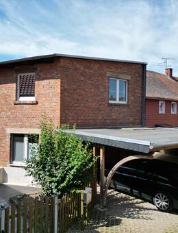PROVISIONSFREI! Gepflegtes Einfamilienhaus mit vielseitiger Doppelgarage und beschaulichem Garten in Remlingen - Remlingen (Niedersachsen)