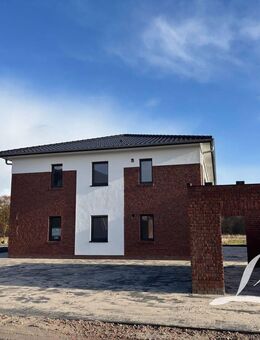 **Gemütliche Dachgeschosswohnung mit Balkon - Neubau** - Apen