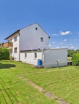 Einfamilienhaus mit herrlich großem Gartengrundstück und zwei großen Garagen - Lenting