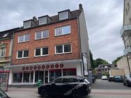 Entwicklungspotenzial! Wohn- und Geschäftshaus mit einem Anbau und Garagen in zentraler Lage! - Herten