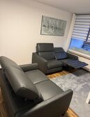 Zweiteilige Ledersofas mit Relaxfunktion in 28307