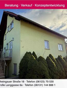 Freistehendes, massiv gebautes Einfamilienhaus mit Blick in schöner Lage von Nieder-Olm - Nieder-Olm