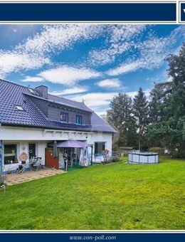 Traumhafte Aussichtslage am Feld- und Waldrand: Vermietetes 2-Familienhaus mit Doppelgarage+ Stellpl - Weilrod