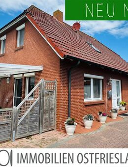 Perfekt für die Familie: Gepflegtes Einfamilienhaus mit Garage und sichtgeschütztem Garten - Krummhörn