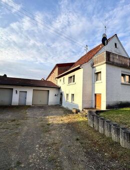 Hefersweiler: Renovierungsbedürftiges Einfamilienhaus mit großer Garage und Hofgelände - Hefersweiler