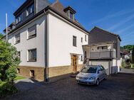 Attraktives Mehrfamilienhaus mit Garage, Lager, Apartment und angebautem Einfamilienhaus in Neheim! - Arnsberg