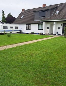 Saniertes Einfamilienhaus mit Einliegerwohnung im Bietverfahren - Hambergen