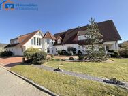 Großzügiges Wohnhaus mit zwei Wohneinheiten und Garagen in Lastrup OT Kneheim - Lastrup