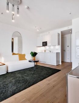 Bezugsfertig: Lichtdurchflutete 2-Zimmer-Wohnung mit Süd-Balkon und 24/7-Concierge - Frankfurt (Main)