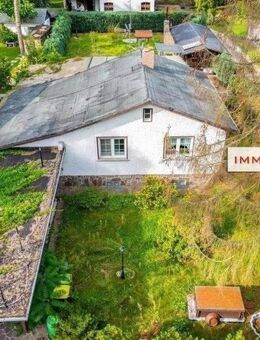 IMMOBERLIN.DE - Wohlfühllage: Netter Bungalow auf herrlichem Grundstück - Hoppegarten