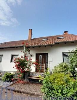 Freistehendes Wohnhaus mit Einl.whg. in schöner Stadtrandlage von Homburg - Homburg